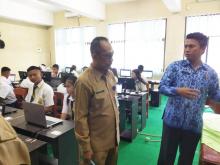 Sekda Bolmong Buka UNBK SMP di Yadika